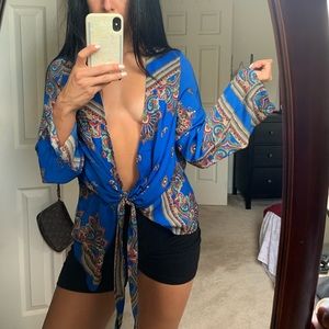 Deep plunge flowy top